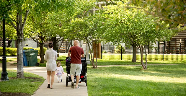 couple-strolling-with-child-South-Loop_Blog-Image