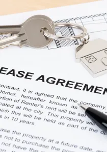 copy of a Chicago apartment lease with scissors cutting the lease