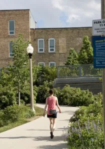 apartment renter taking a walk on the 606 Bloomingdale Trail in Chicago's Bucktown neighborhood