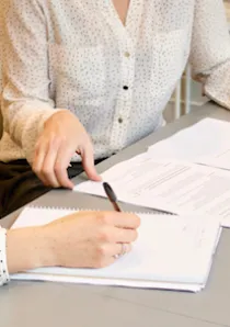 landlord reviewing required disclosure documents with tenant