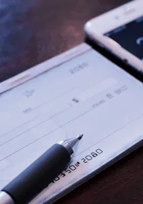 a checkbook used to write a personal check for an apartment security deposit