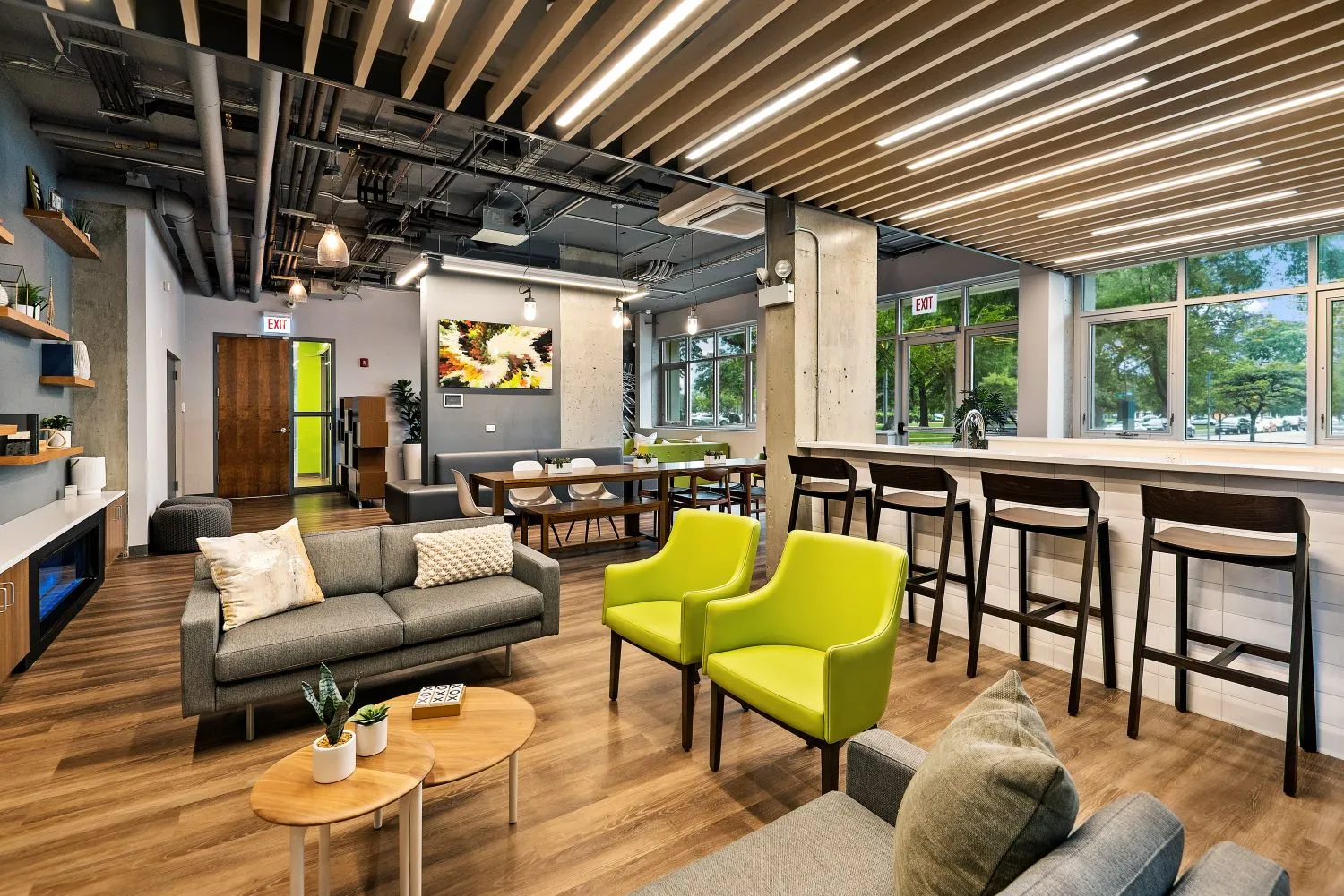 trees in front of the glass Lake Meadows Apartments in Bronzeville Chicago