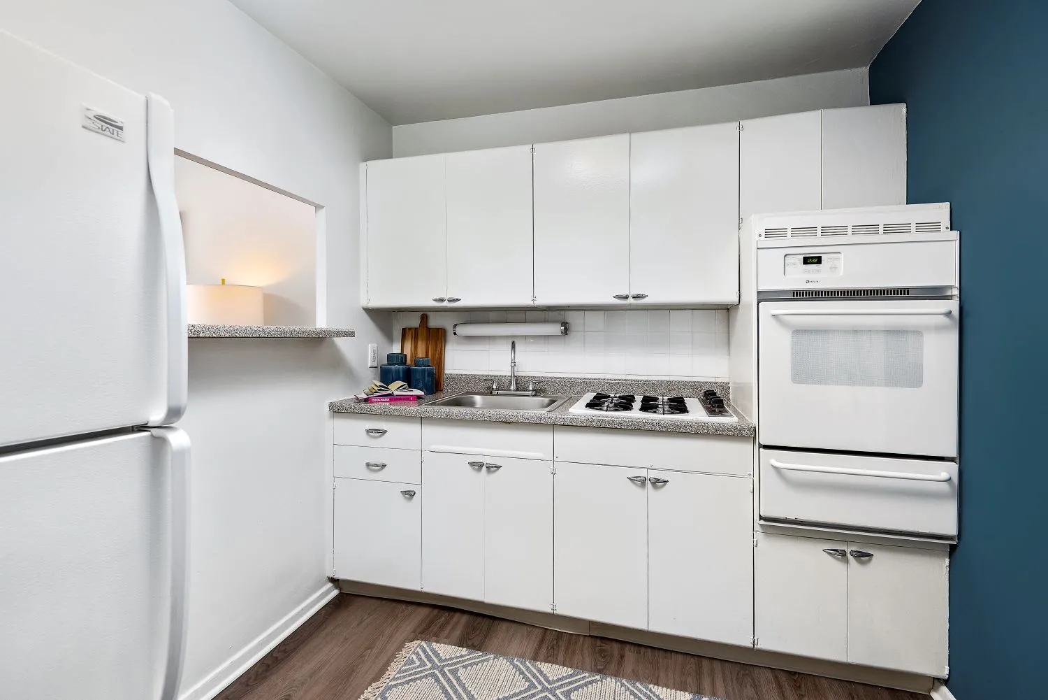 trees in front of the glass Lake Meadows Apartments in Bronzeville Chicago