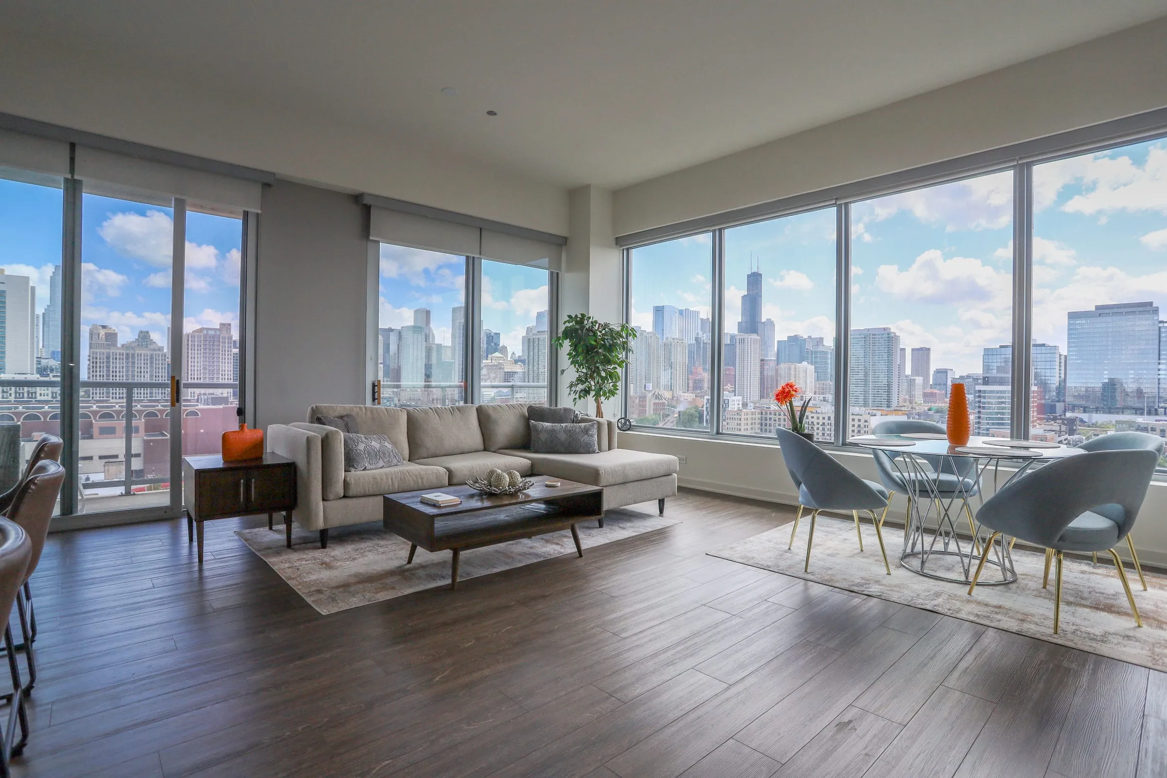 living room and view of chicago at Mondial River West Apartments