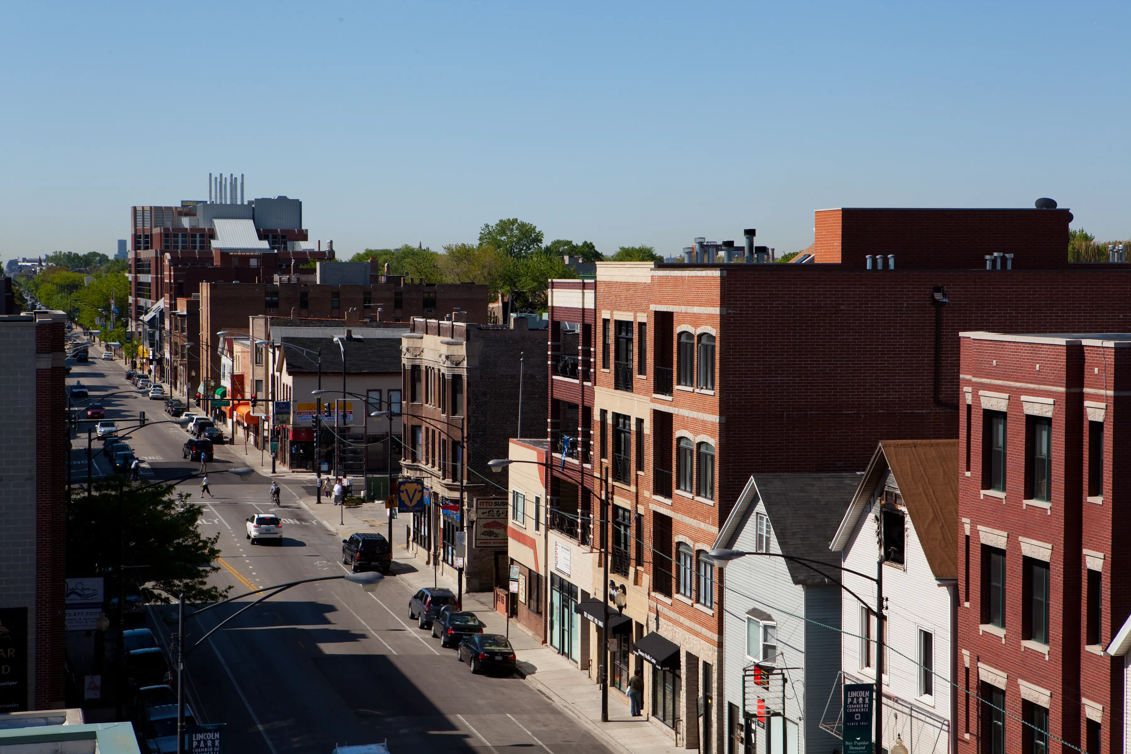 drone shot of clark st from aerial view in lakeview chicago