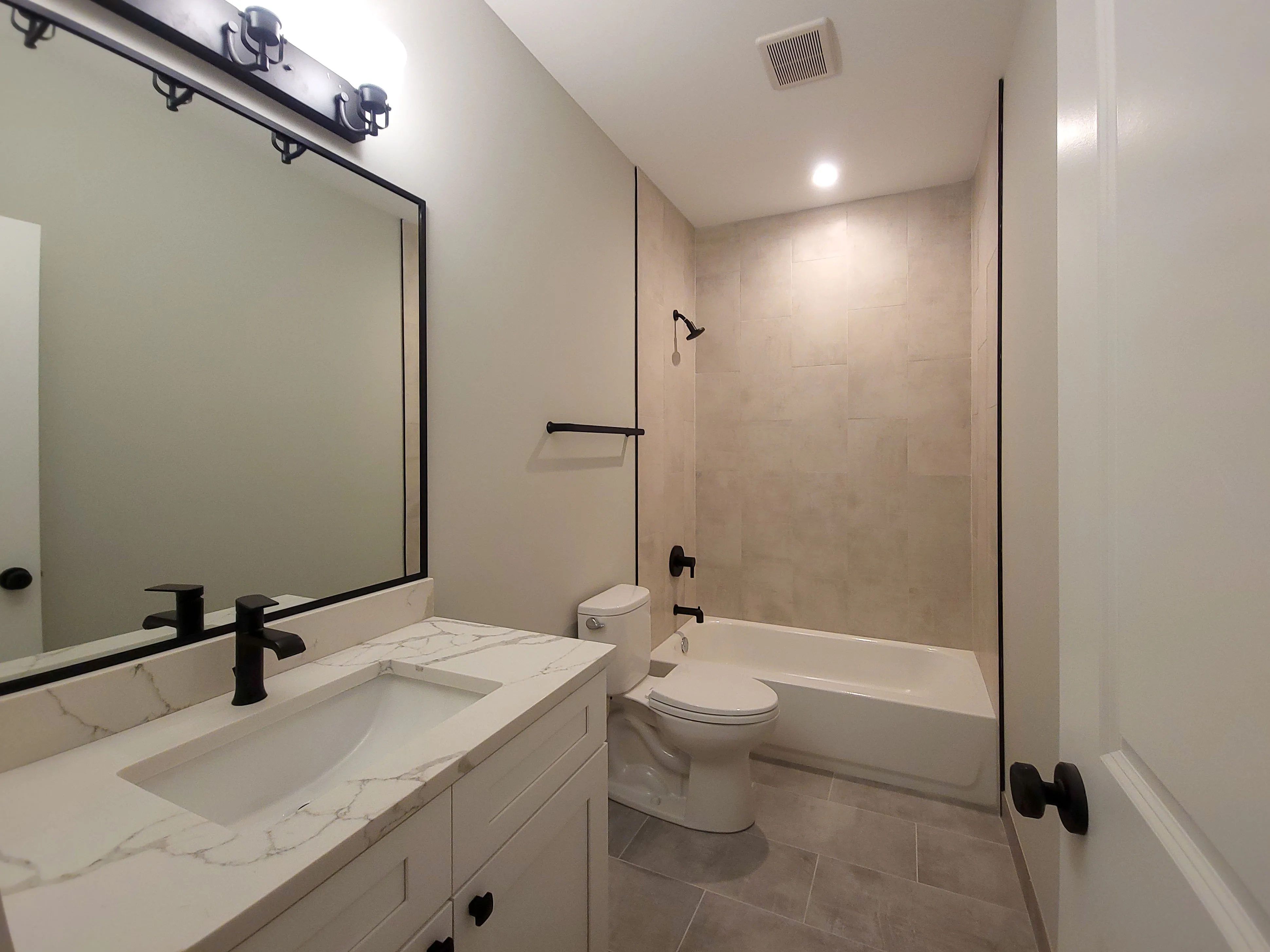 shower at 2020 West Montrose Apartments in Ravenswood, Chicago
