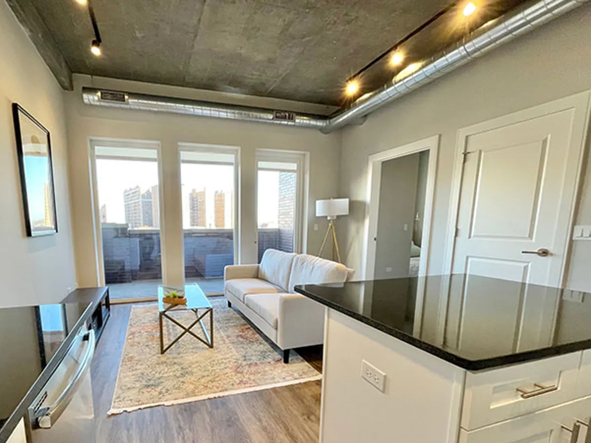 Open concept living room at the Eagle Building Chicago