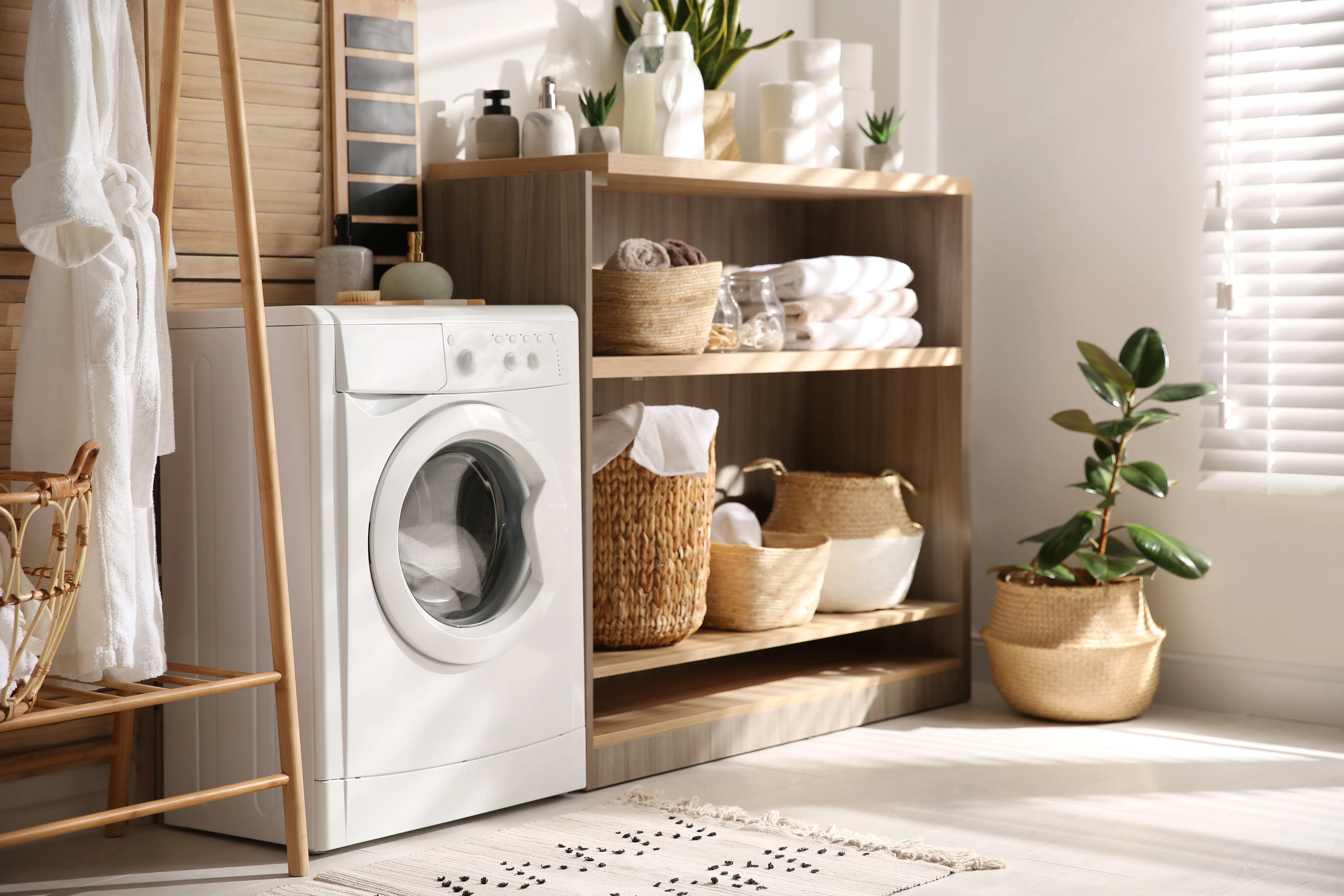 modern_washing_machine_in_apartment_laundry_room