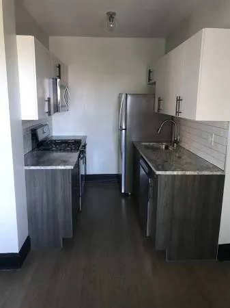 living area in model unit at The Edison Apartments in Edgewater!