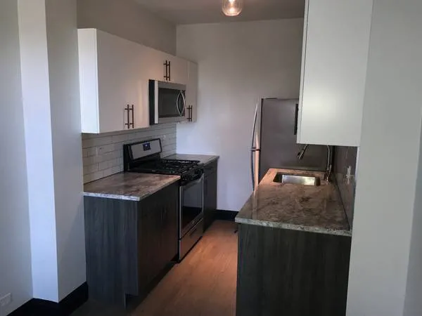 living area in model unit at The Edison Apartments in Edgewater!