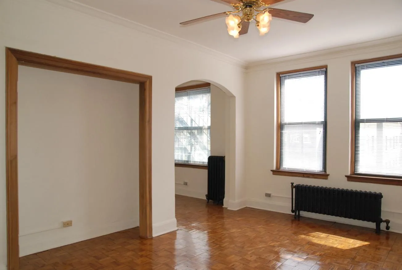 One bedroom (living room) at 429 W Roscoe Apartments in Lakeview Chicago