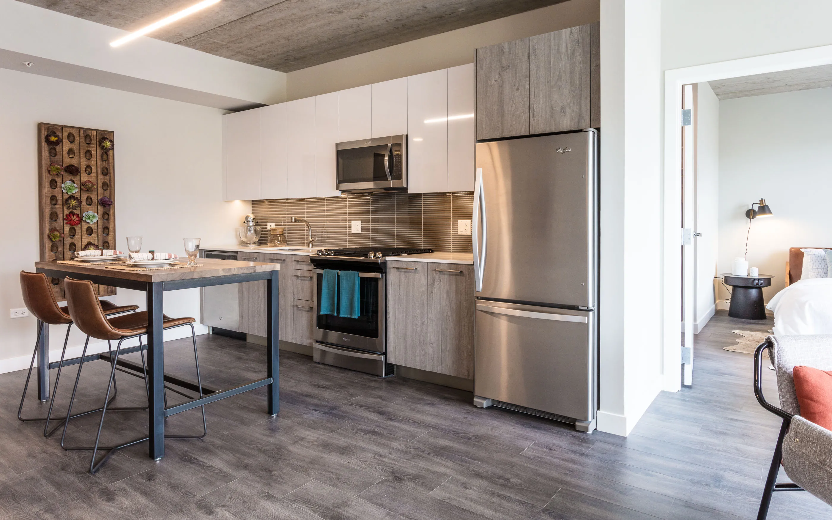 1 bedroom model kitchen and living area at Centrum Bucktown Apartments 