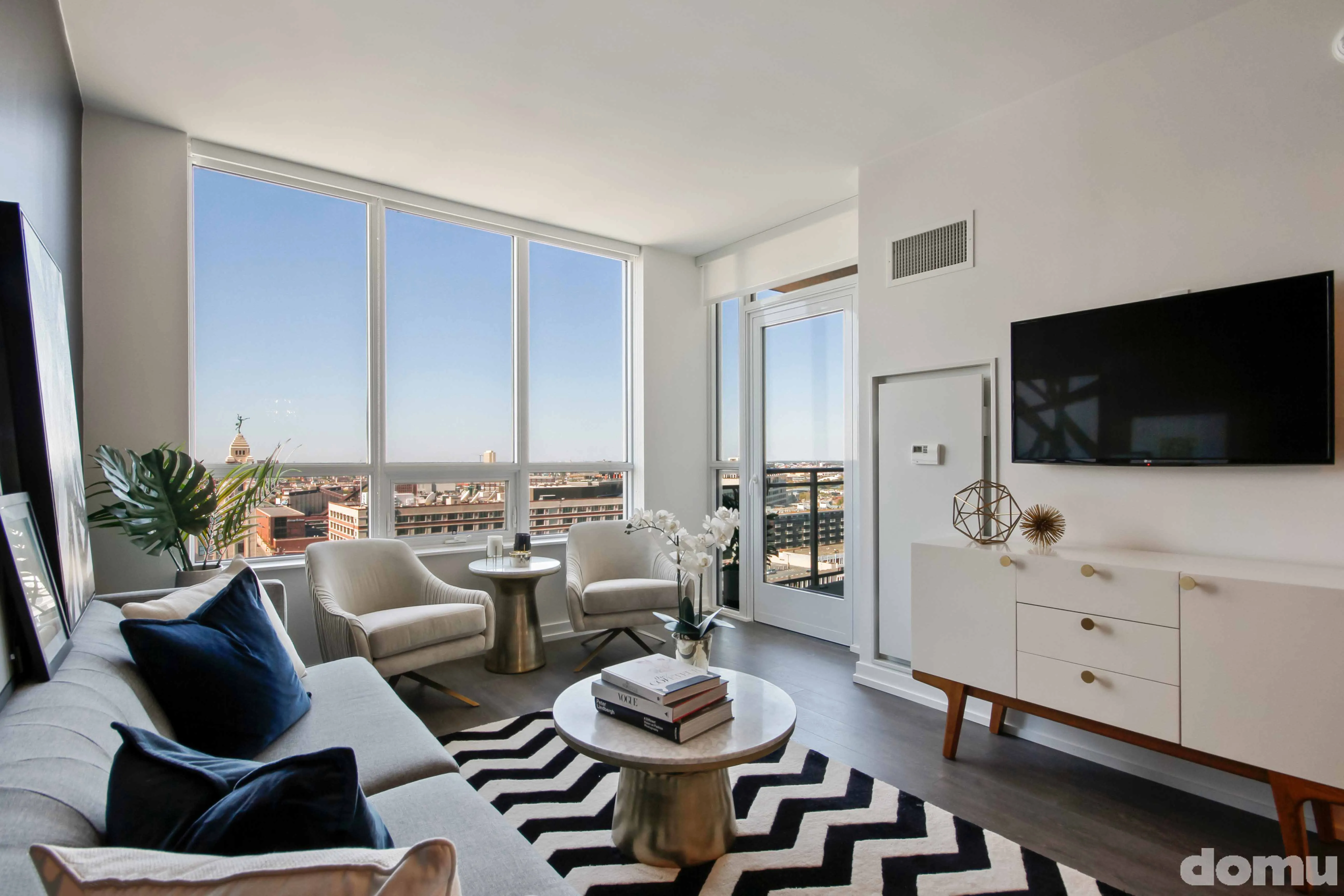 furnished living room with view at The Hudson Apartments in Chicago