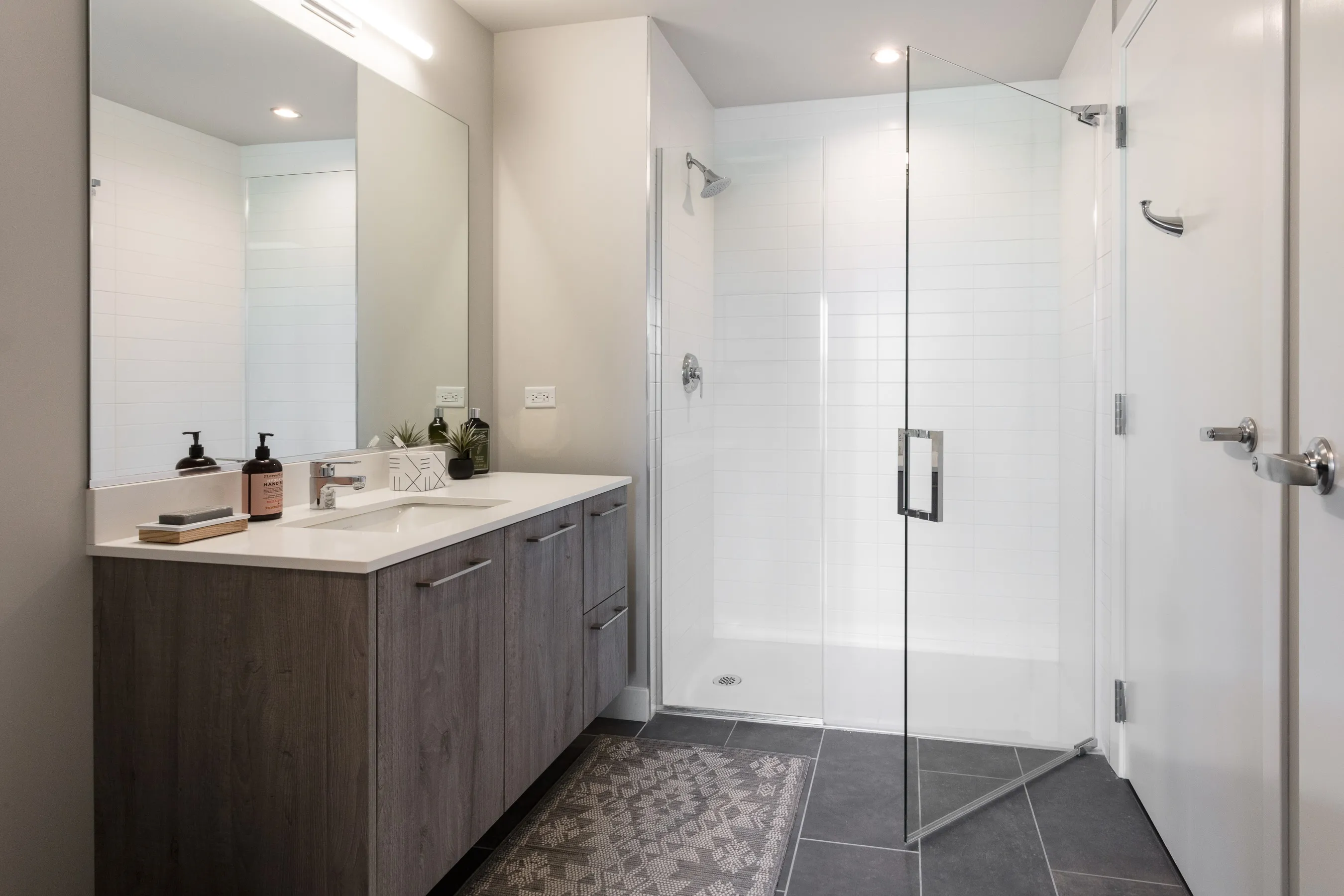 1 bedroom model kitchen and living area at Centrum Bucktown Apartments 