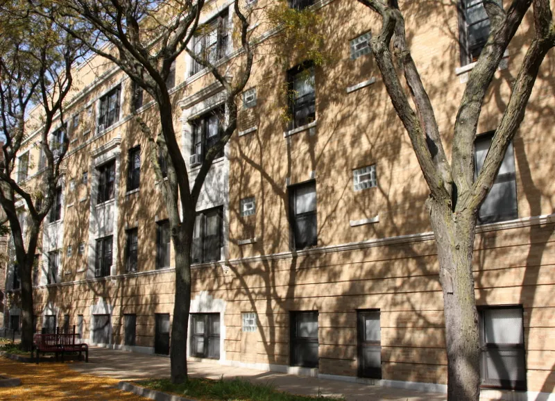 view from street of the brick facade of 4500 North Malden Apartments 
