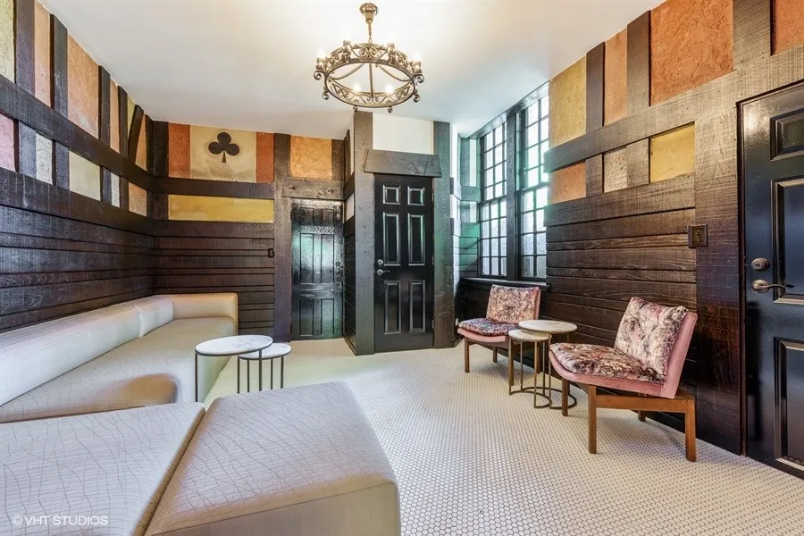 one bedroom living room with wood flooring at 1033 West Loyola Apartments