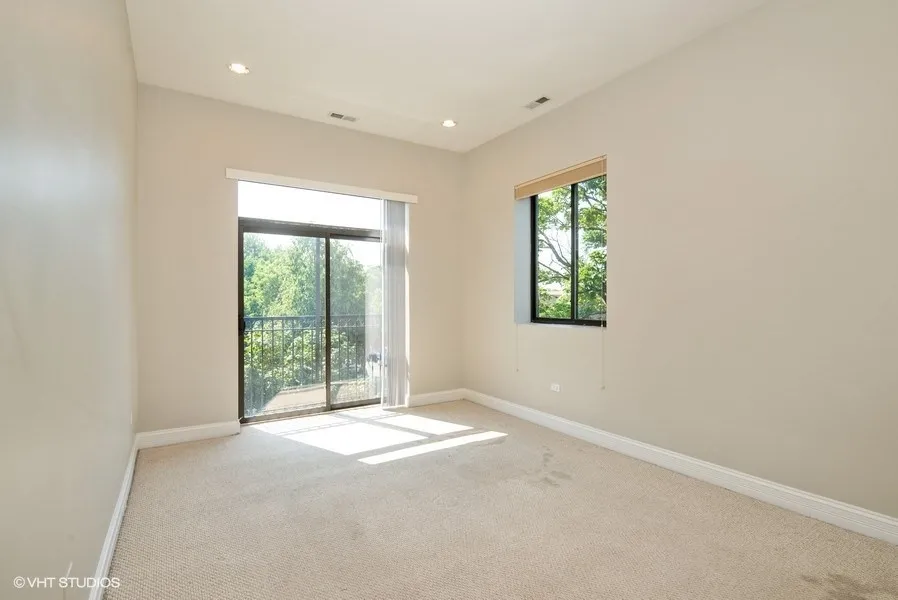 living room model unit at 4651 N Greenview Apartments