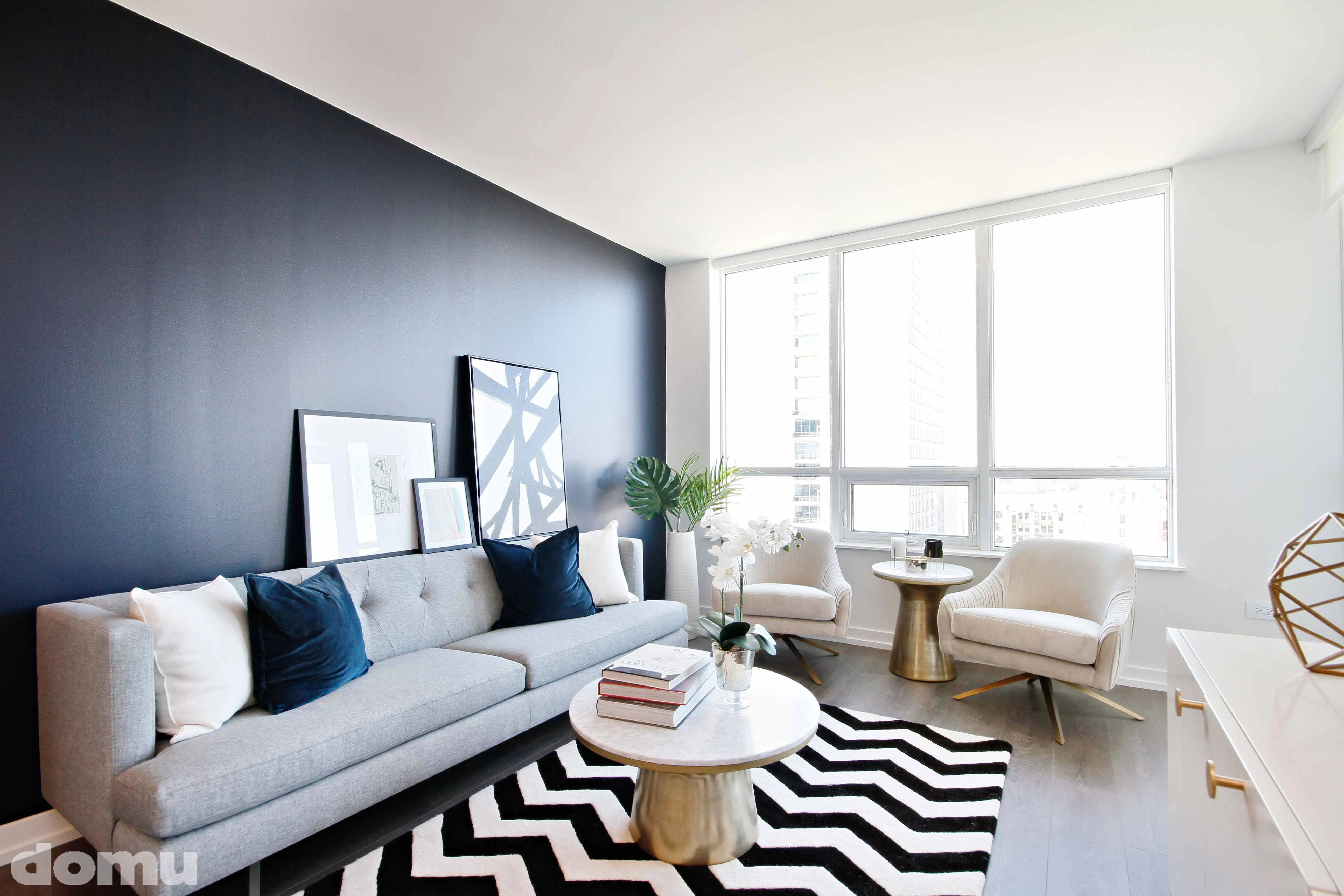 fitness room with weights at The Hudson Apartments in Chicago