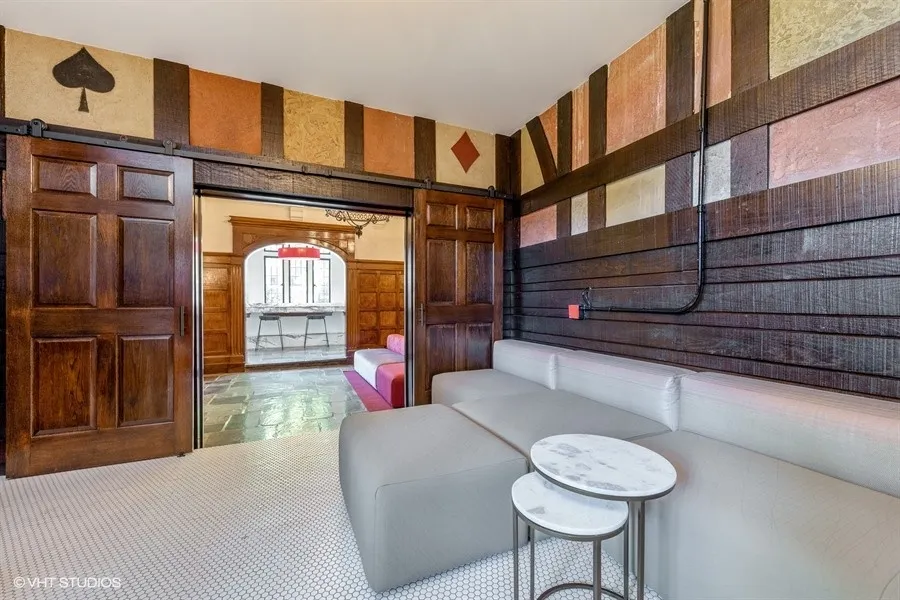 one bedroom living room with wood flooring at 1033 West Loyola Apartments