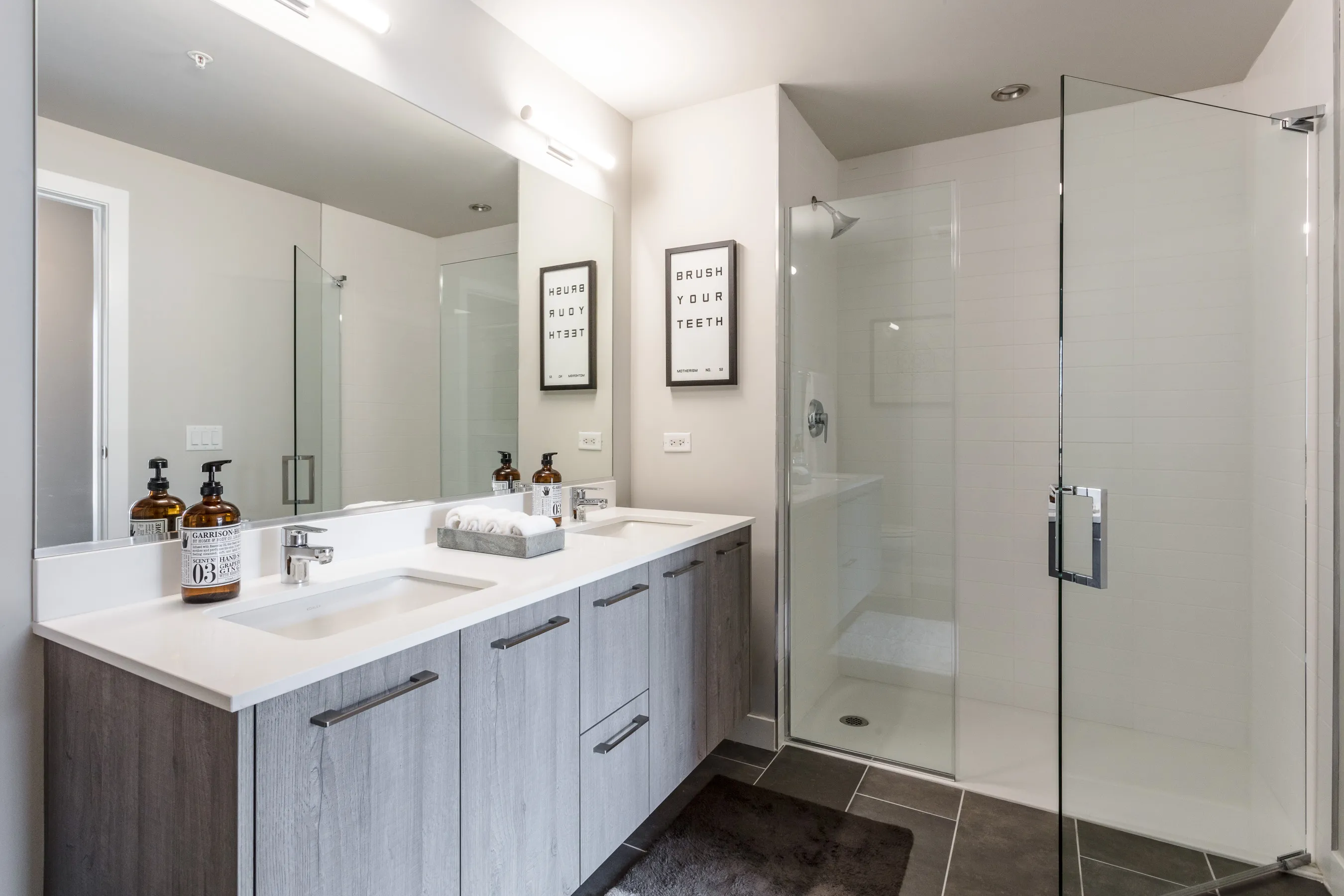 1 bedroom model kitchen and living area at Centrum Bucktown Apartments 