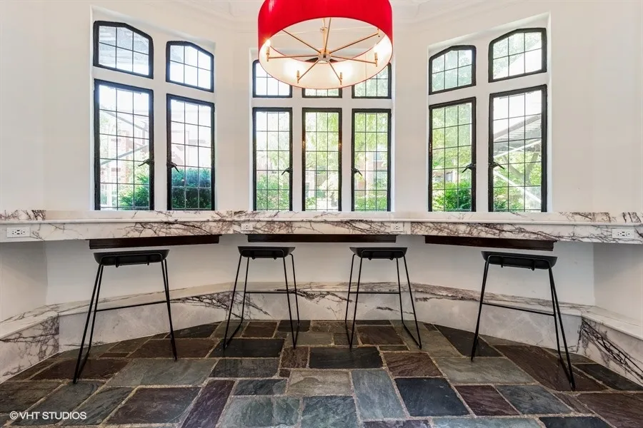 one bedroom living room with wood flooring at 1033 West Loyola Apartments