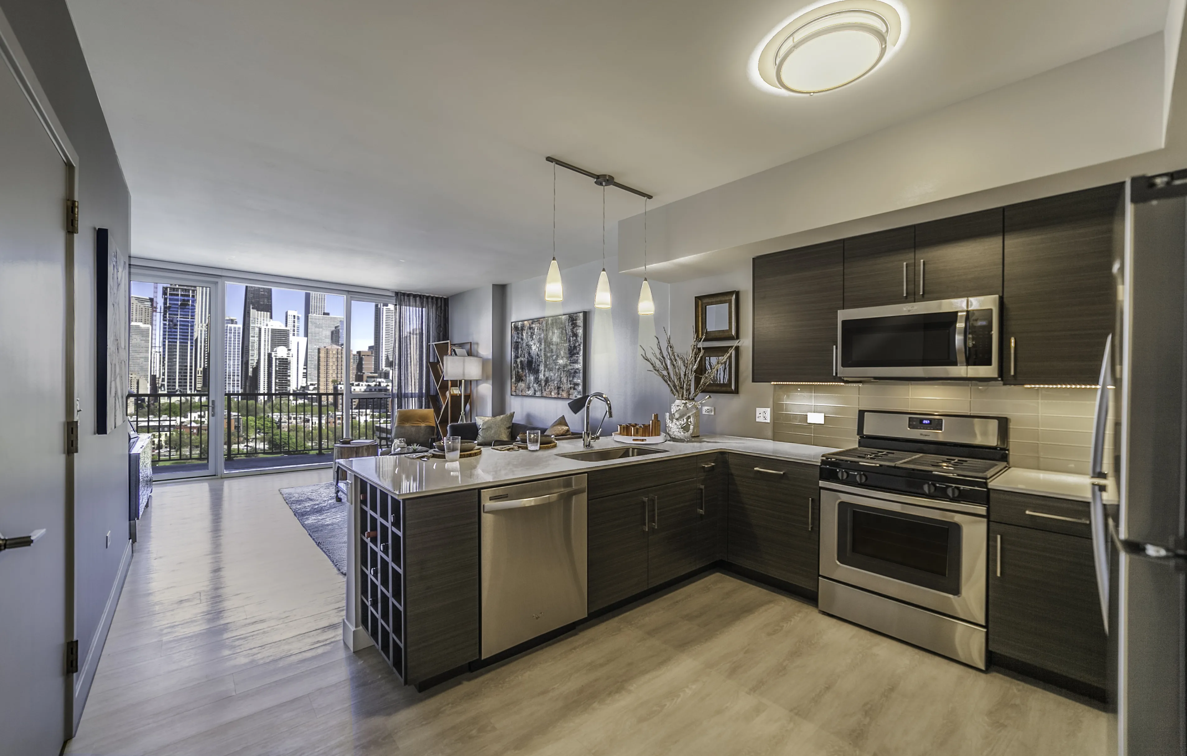 wide view of gym at Niche 905 Apartments in Chicago