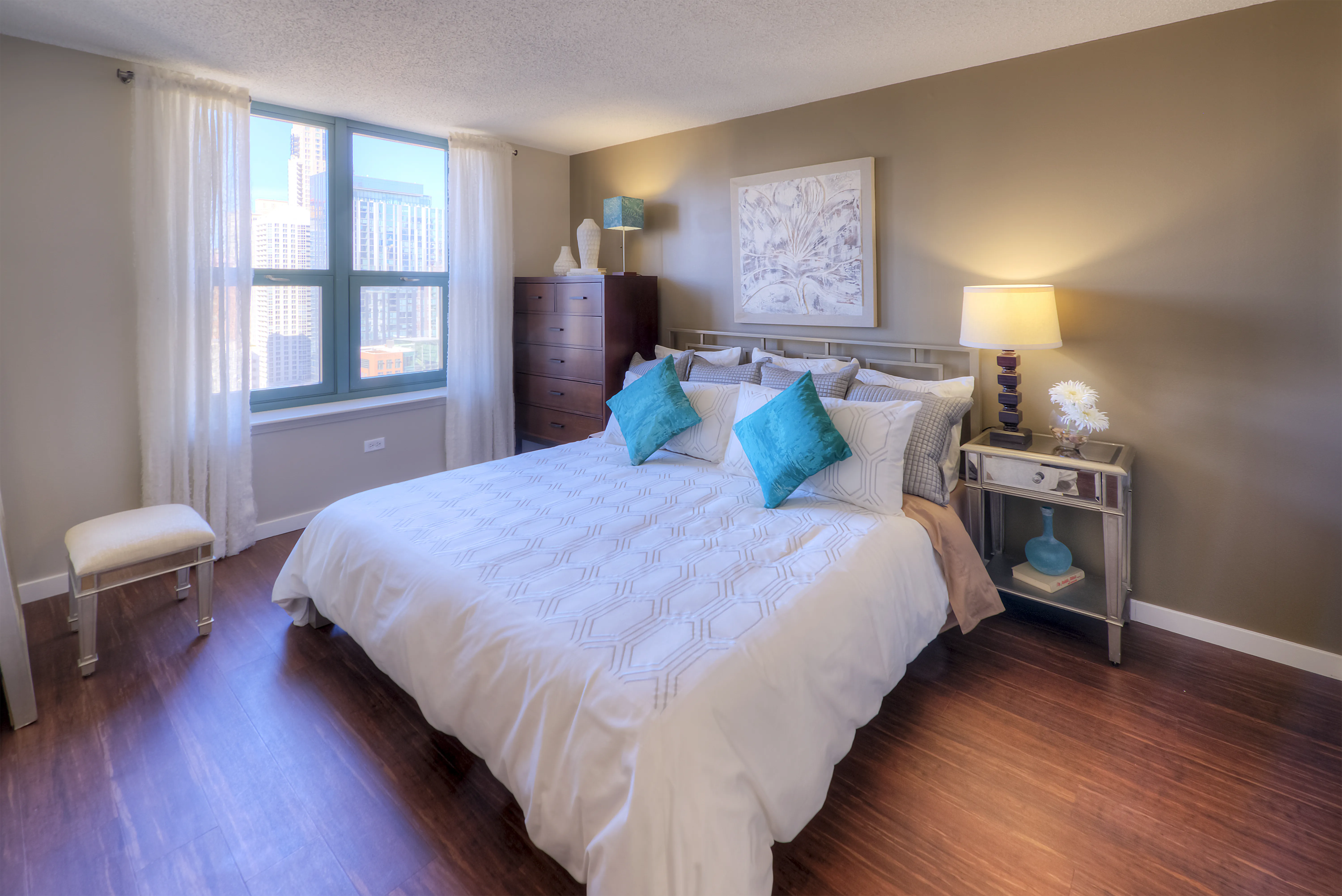 model living room with furnishings at One Superior Place Apartments