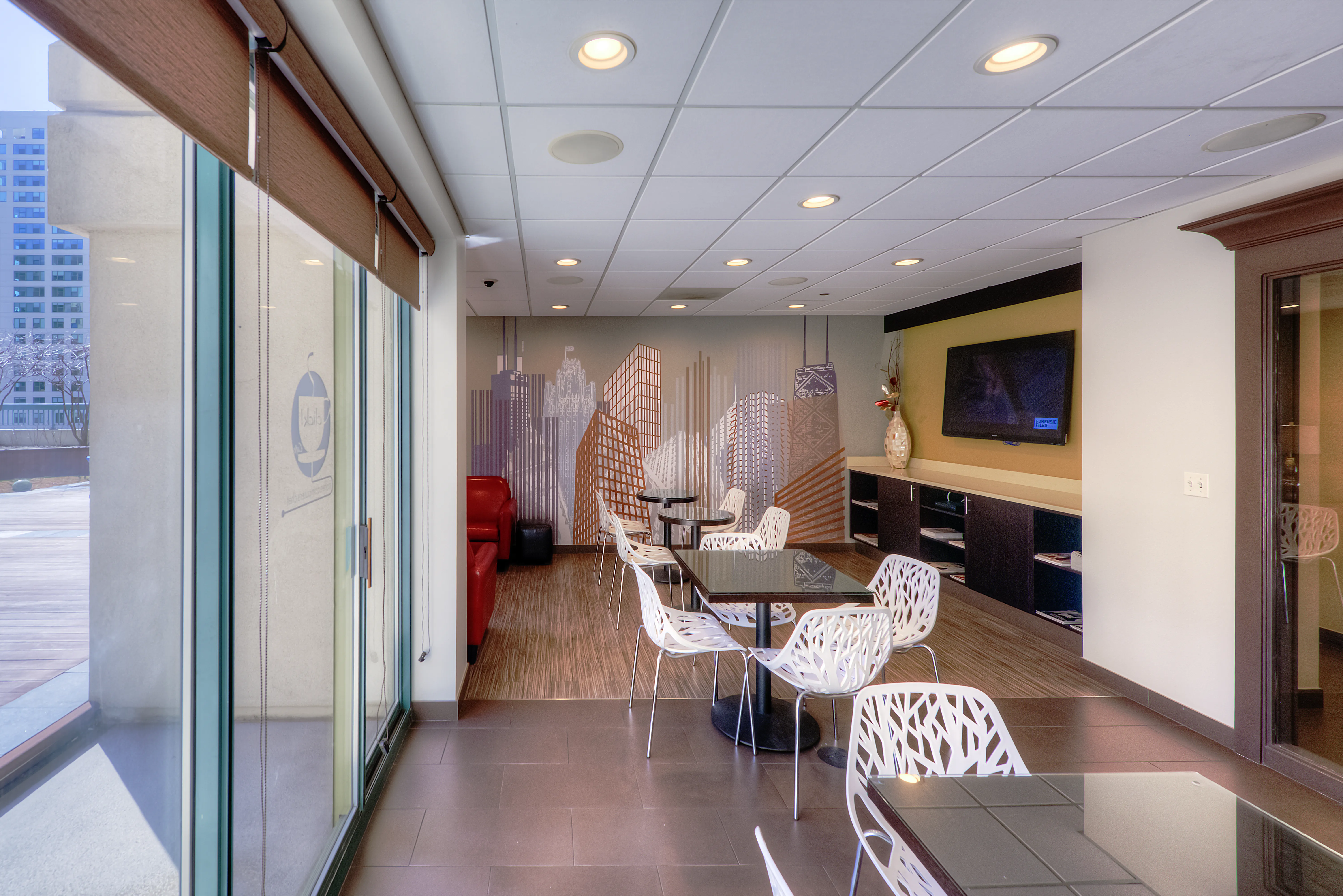 model living room with furnishings at One Superior Place Apartments
