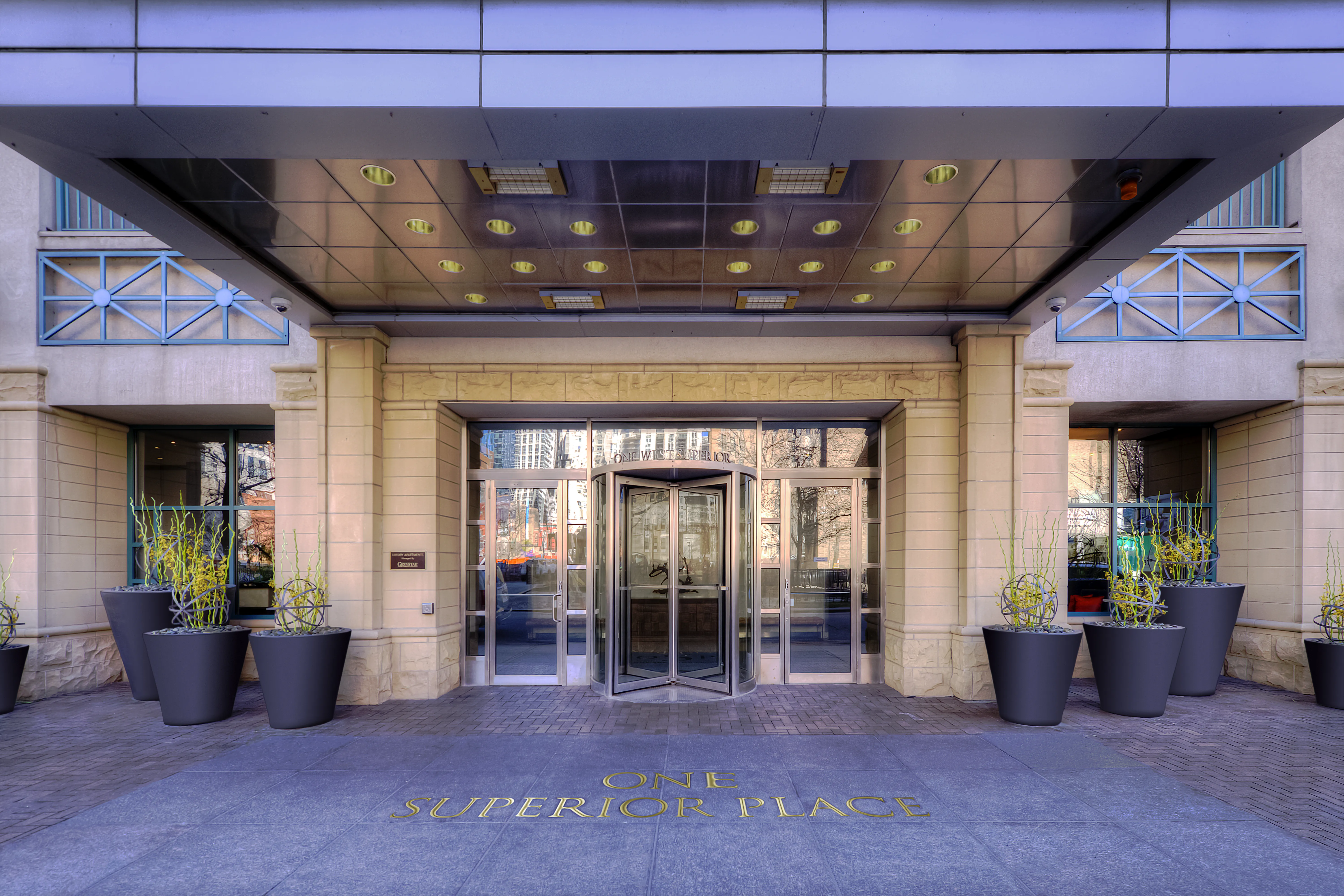 model living room with furnishings at One Superior Place Apartments