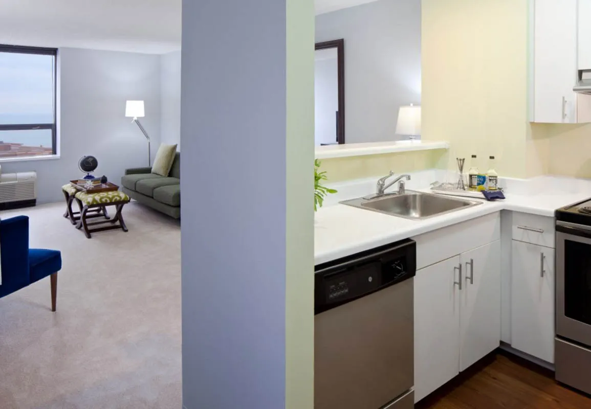 kitchen and living room at Lake Shore Plaza Apartments in Streeterville