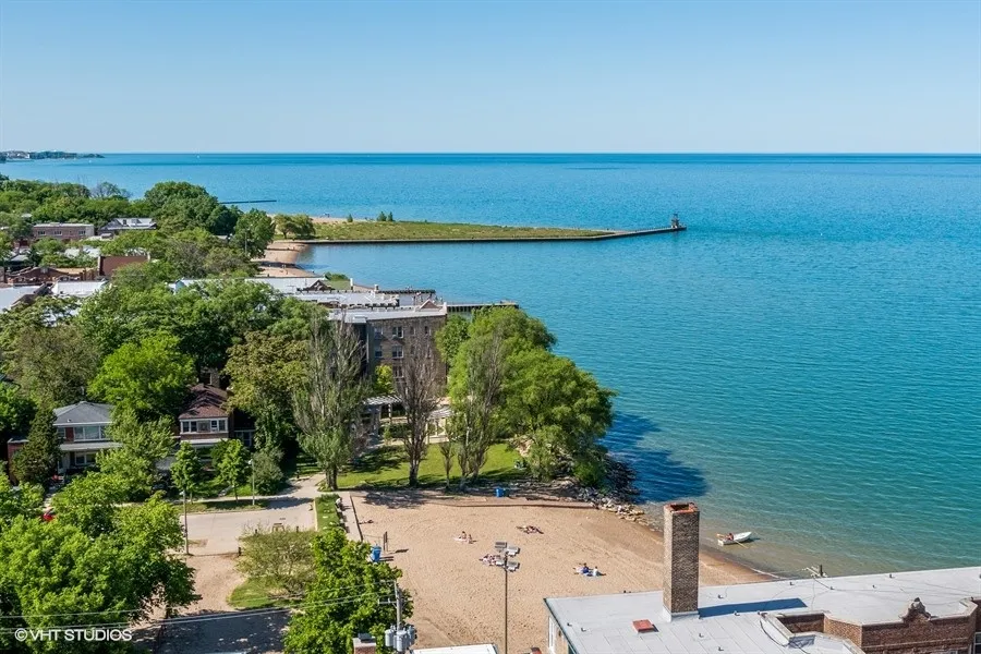 one bedroom living room with wood flooring at 1033 West Loyola Apartments