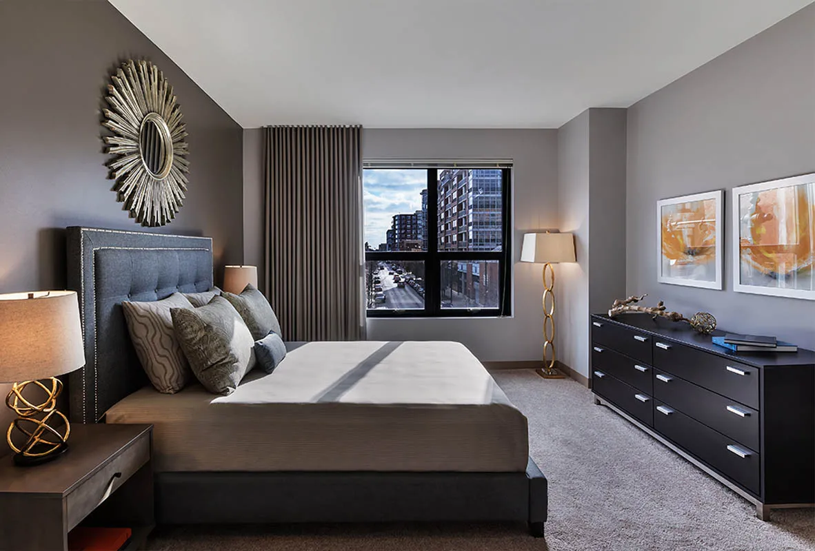 kitchen with view of living room at The Madison at Racine Apartments