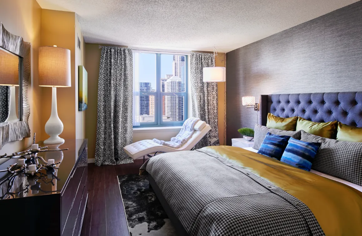 model living room with furnishings at One Superior Place Apartments