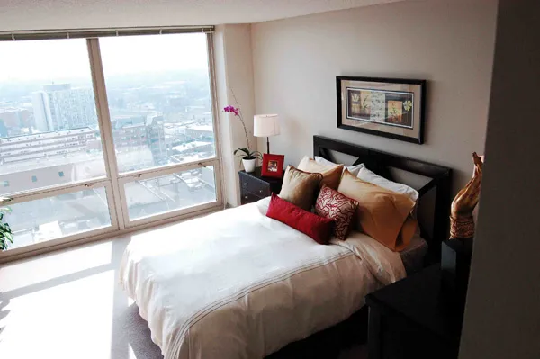 flowers surround the entrance of The Park Evanston Apartments in Evanston