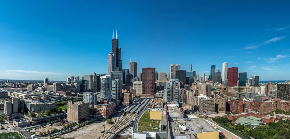 living room and skyline view at 1000 South Clark Apartments