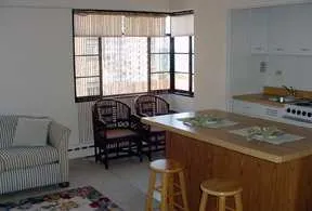 exterior view of trees and the two towers of 5630 North Sheridan Apartments