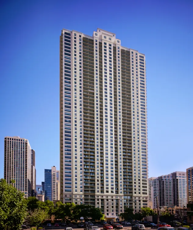 model living room with furnishings at One Superior Place Apartments