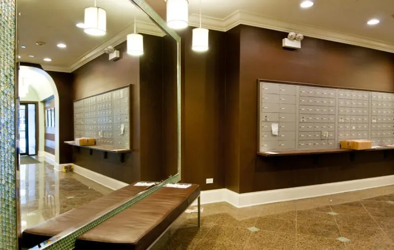 vintage exterior of 11 West Division Apartments in the Gold Coast Chicago