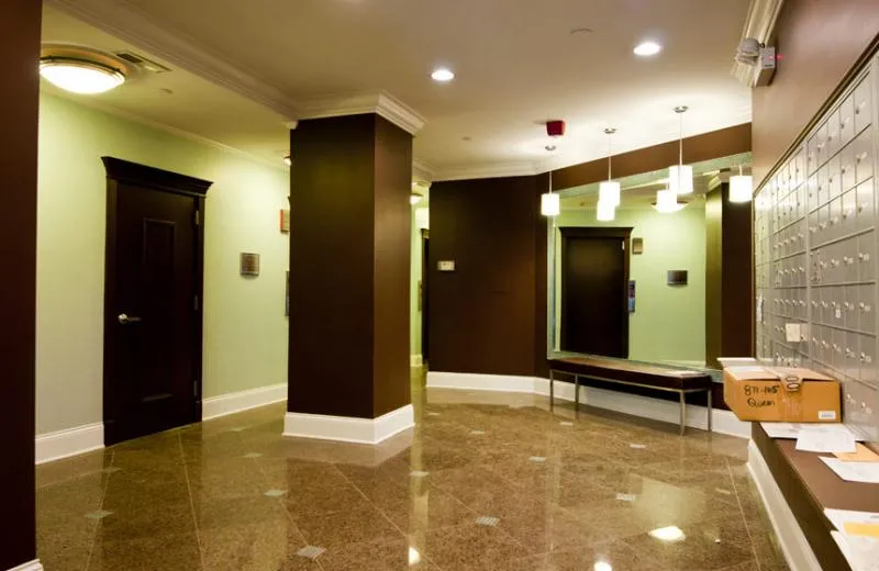 vintage exterior of 11 West Division Apartments in the Gold Coast Chicago