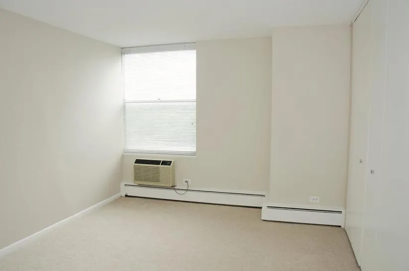 facade of the original historic The Mayfair Apartments in Hyde Park Chicago