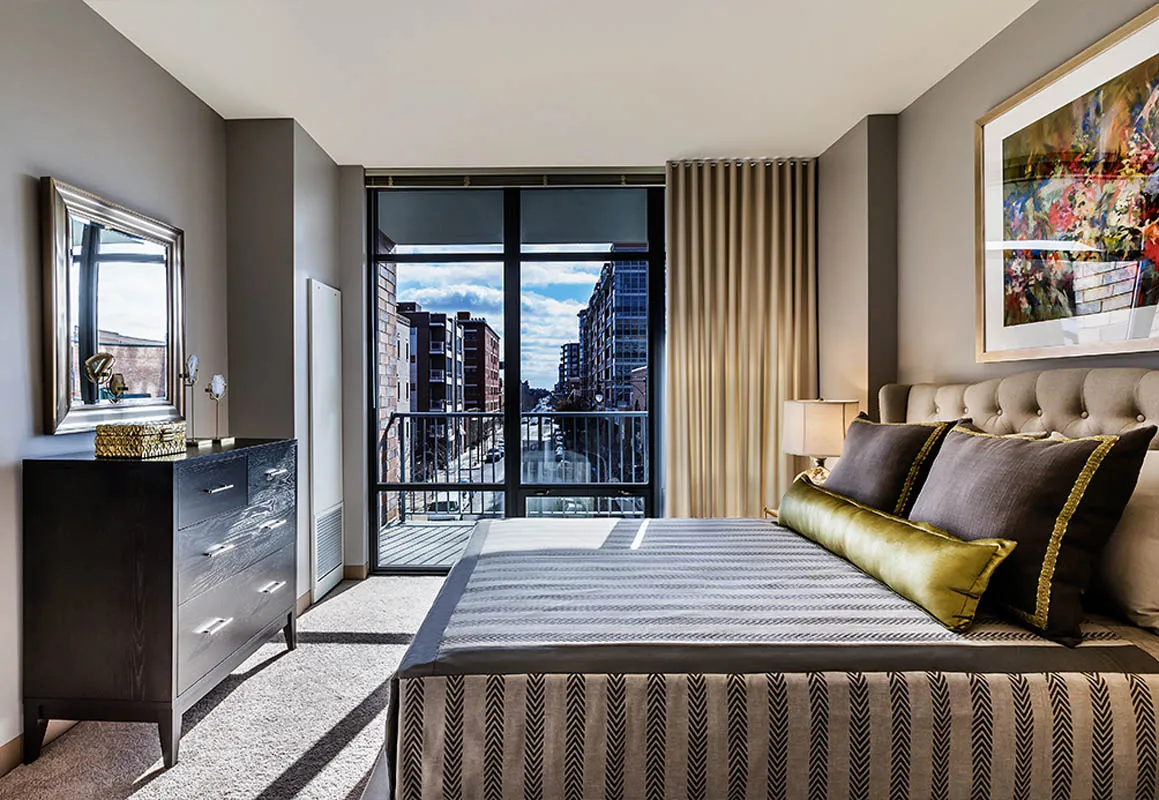 kitchen with view of living room at The Madison at Racine Apartments