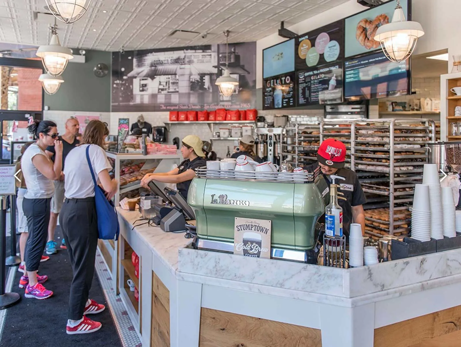 giant loft living room with wood floors at 1550 North Damen Lofts