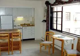 exterior view of trees and the two towers of 5630 North Sheridan Apartments