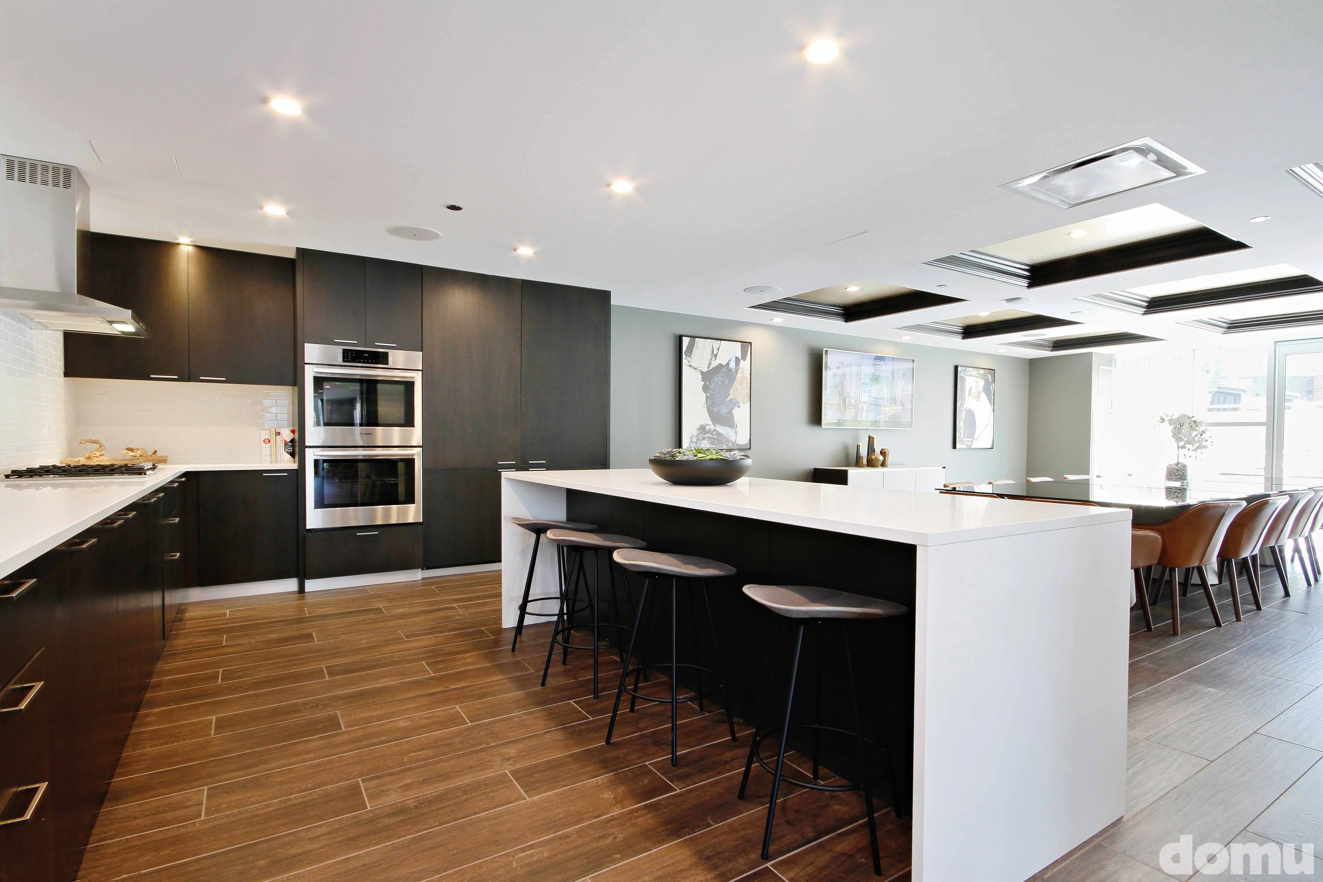 kitc hen with wood cabinets at The Hudson Apartments in Chicago