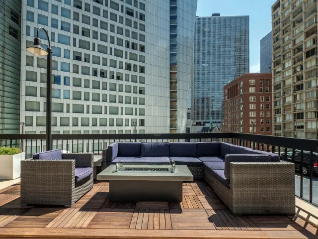 furnished model living room at One East Delaware Apartments