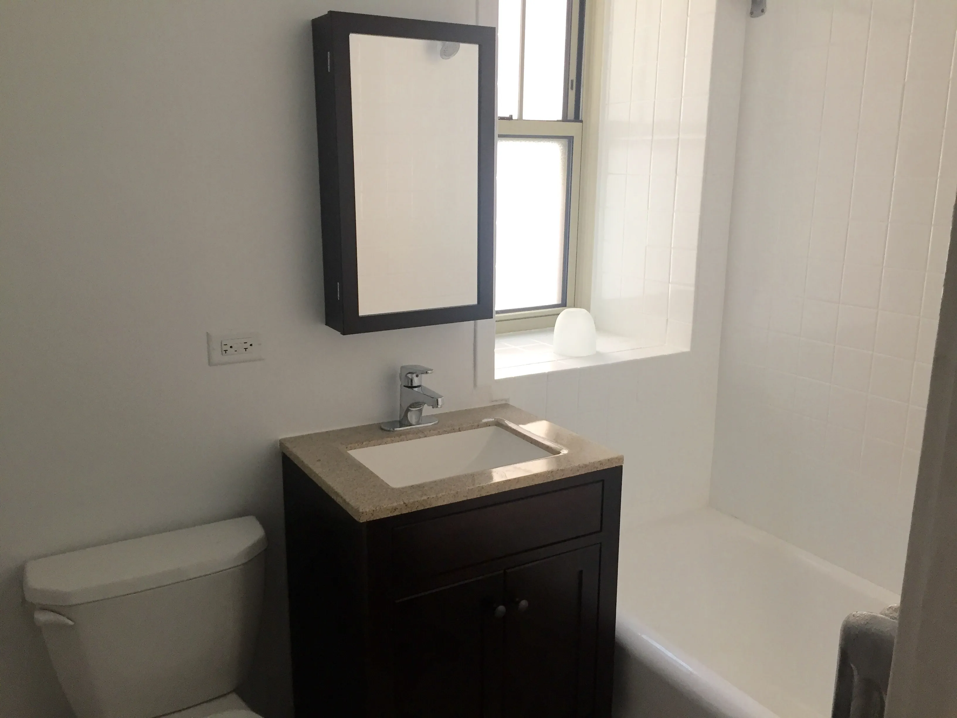 exterior shot with trees of 1310 East Hyde Park Apartments