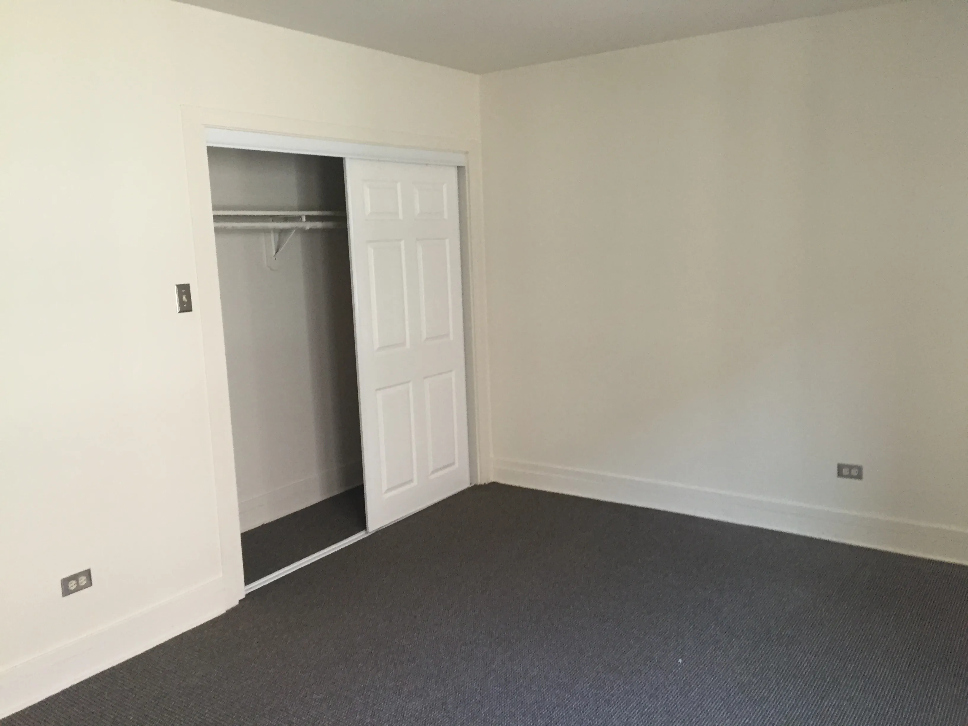 exterior shot with trees of 1310 East Hyde Park Apartments