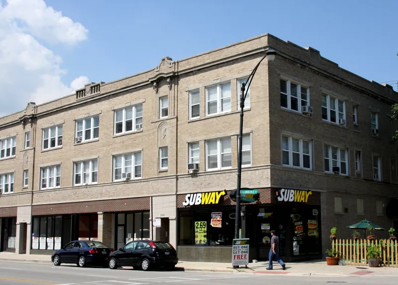 exterior of The Harry Frank Building Apartments in Ravenswood Chicago