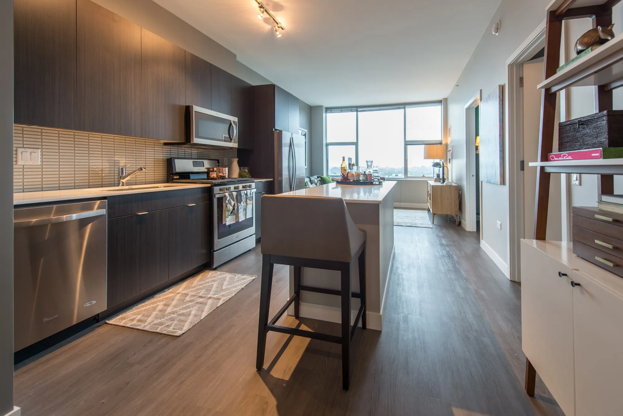 living room and skyline view at 1000 South Clark Apartments