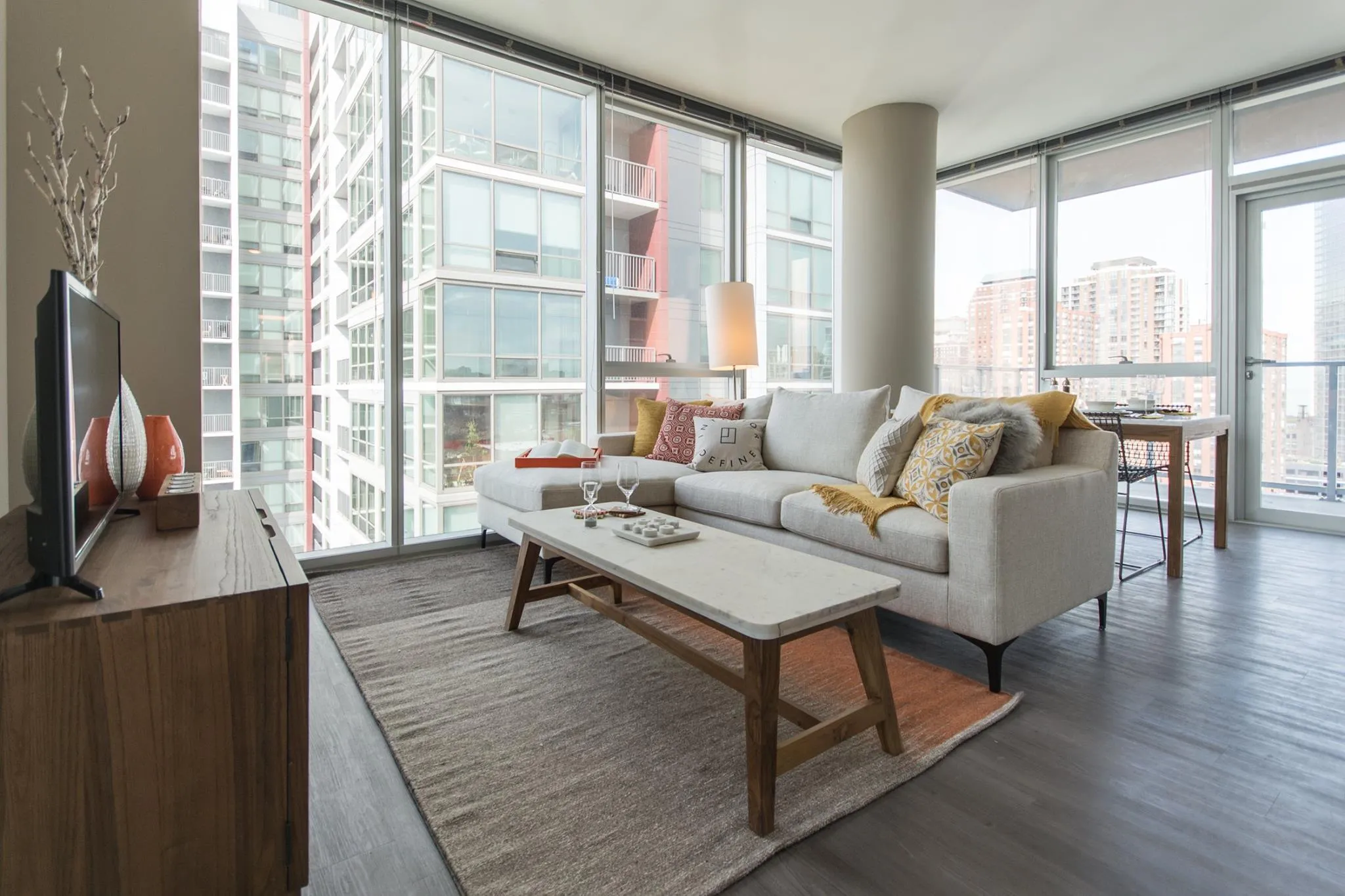 living room and skyline view at 1000 South Clark Apartments